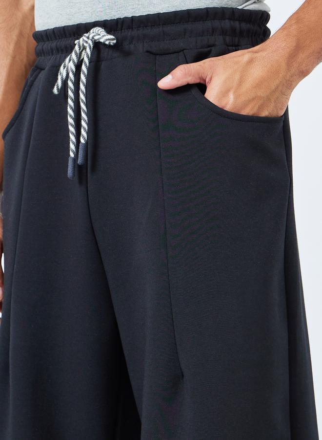 Styli Men Wide Leg Joggers with Back Pocket Detail - Image 3